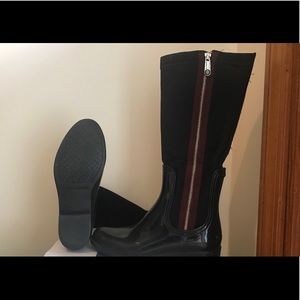 pair of tall navy Tommy Hilfiger boots